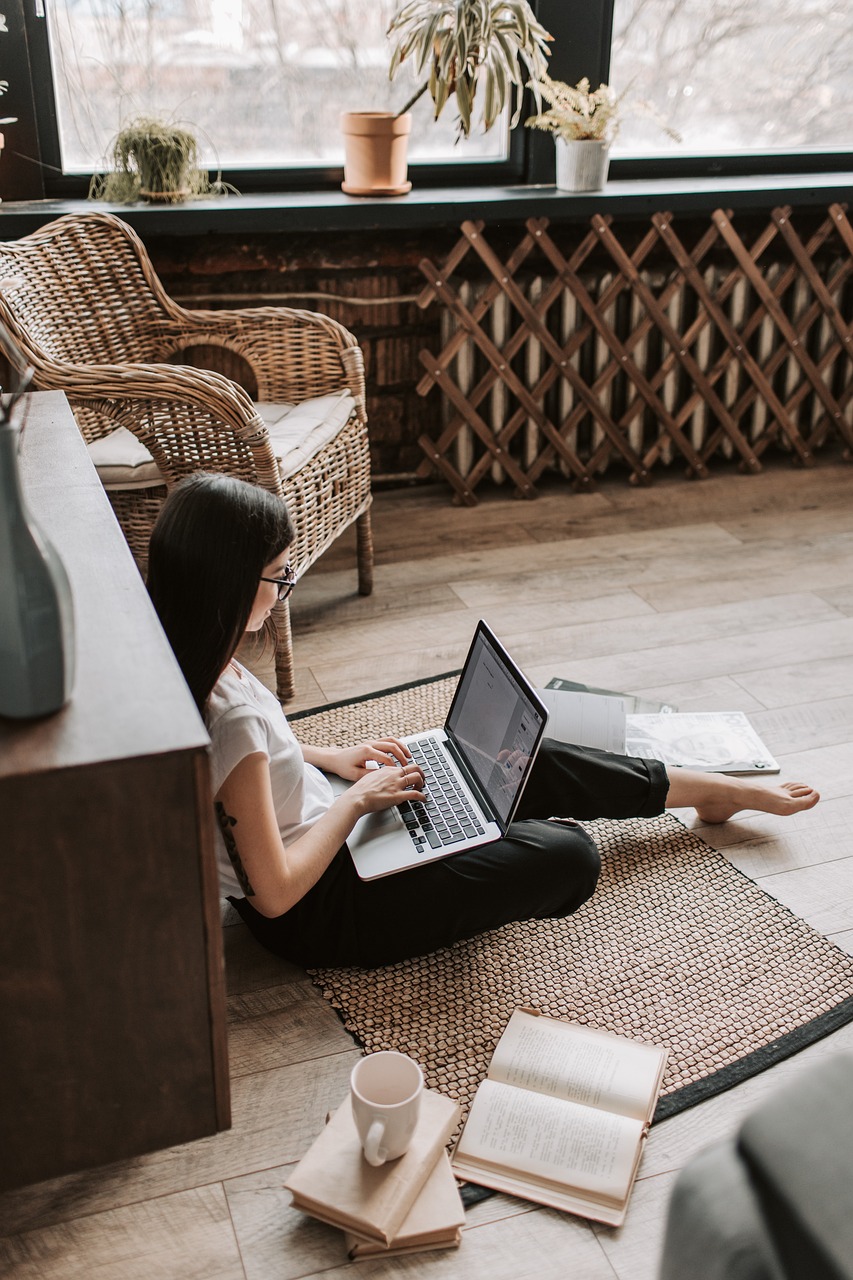 woman typing on computer